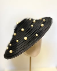 Image 1 of Black asymmetrical hat.