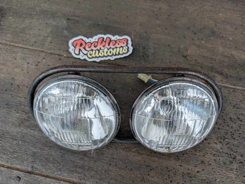 **GARAGE SALE ITEM Zoomer Headlights and Ring 