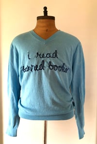 Image 1 of Gently pre-owned “I read banned books” hand-embroidered sweater