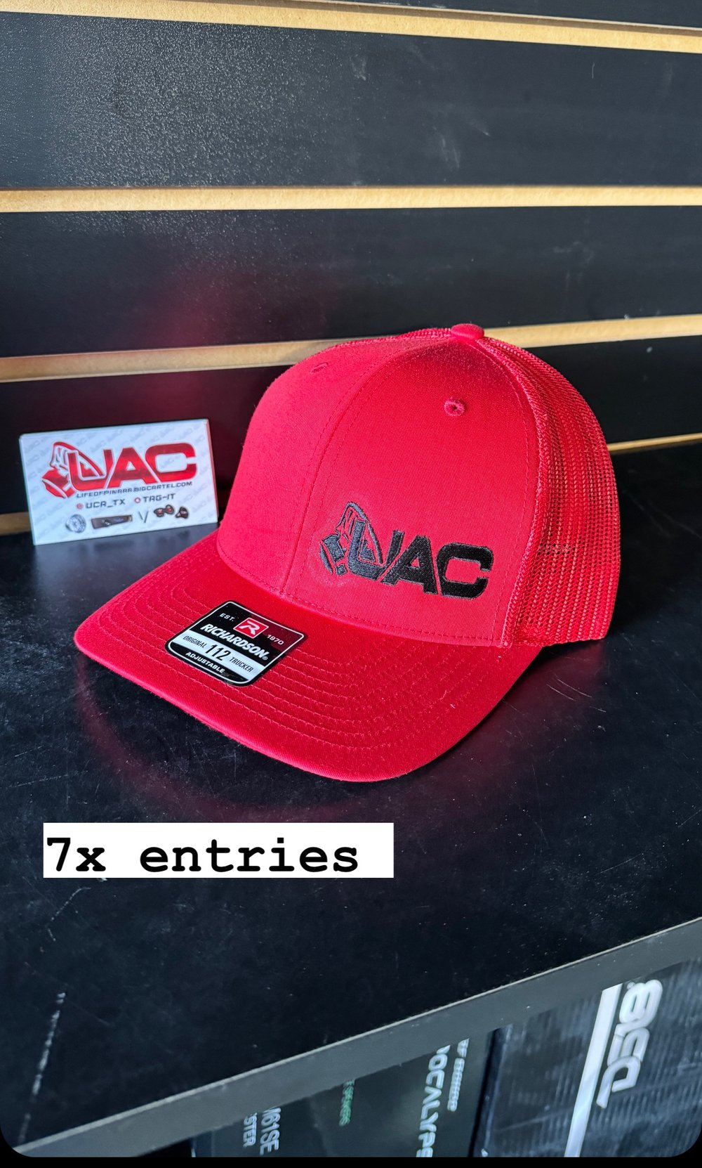 UAC hat black and red 