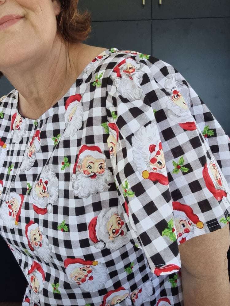 Image of ZADIE GINGHAM SANTA FRILL & FLUTTER SLEEVE. AVAILABLE IN EXTRA SMALL & EXTRA LARGE