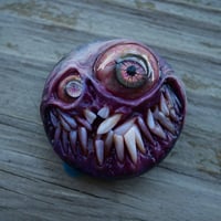 Image 11 of Custom Swappable Phone Grip for smartphones, reflective pupil, glow in the dark. Madballz