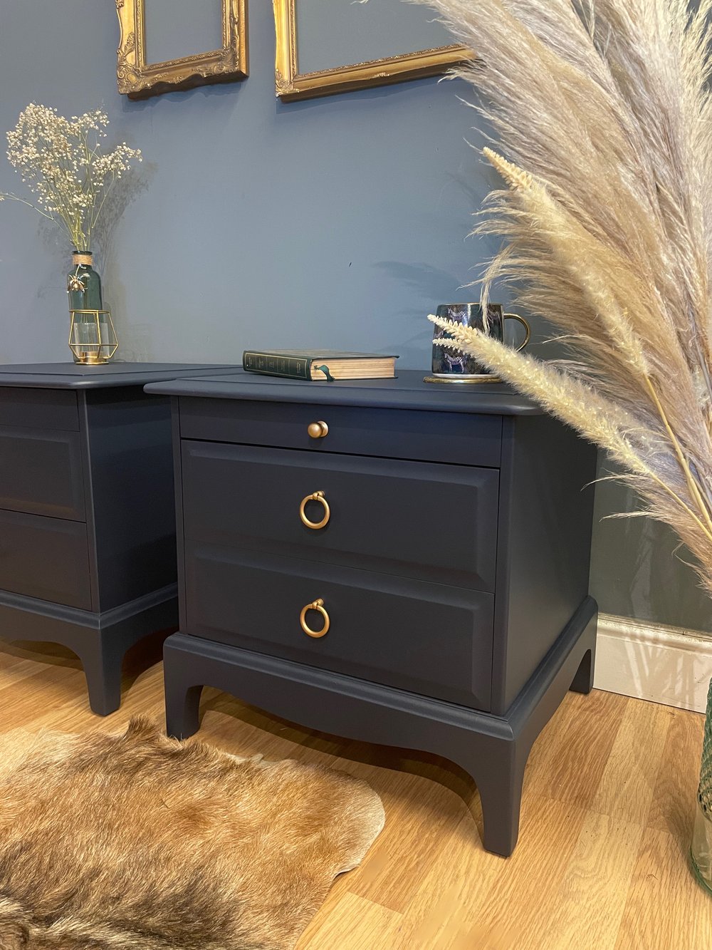 Image of Dark blue stag bedside tables 