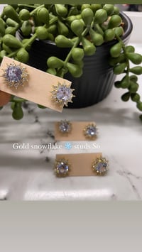 Gold snowflake studs 