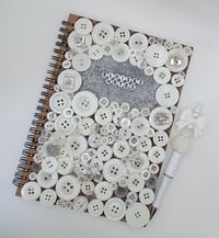 Image 1 of Notebook and Pen