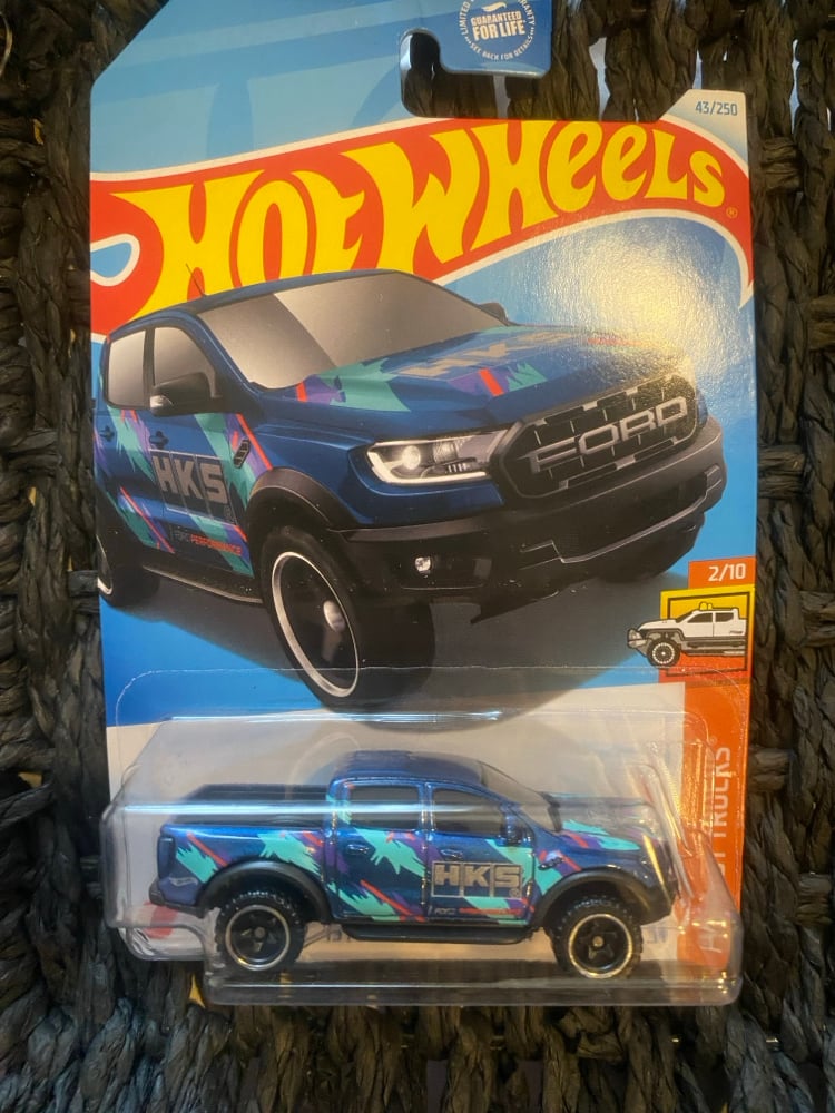 Image of Hot Wheels toy car racer truck 43/250