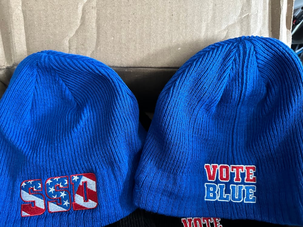 Blue New Era SSD Democracy Knit Beanie with Rear “Vote Blue” logo