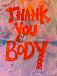 Image 1 of Rainbow multi colour tie dye tshirt with orange text (small) 