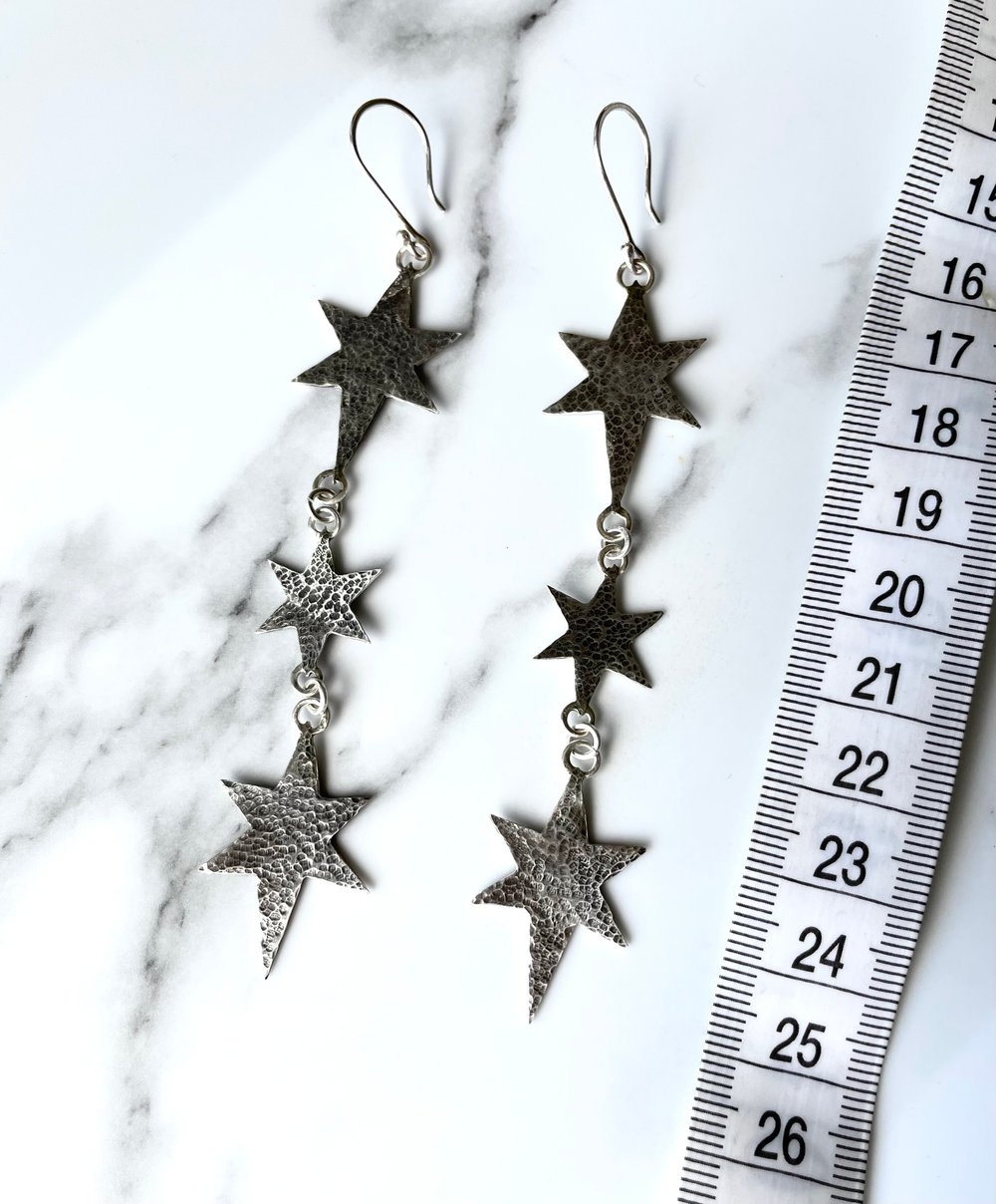 Handmade Silver Cosmic Triple Star Dangly Earrings. Celestial Silver Starry Earrings