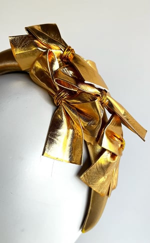 Image of Gold headband w bows 