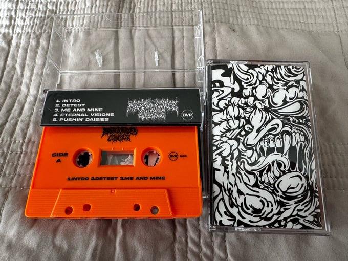 Image of Cassette S/T Dragged Across Concrete