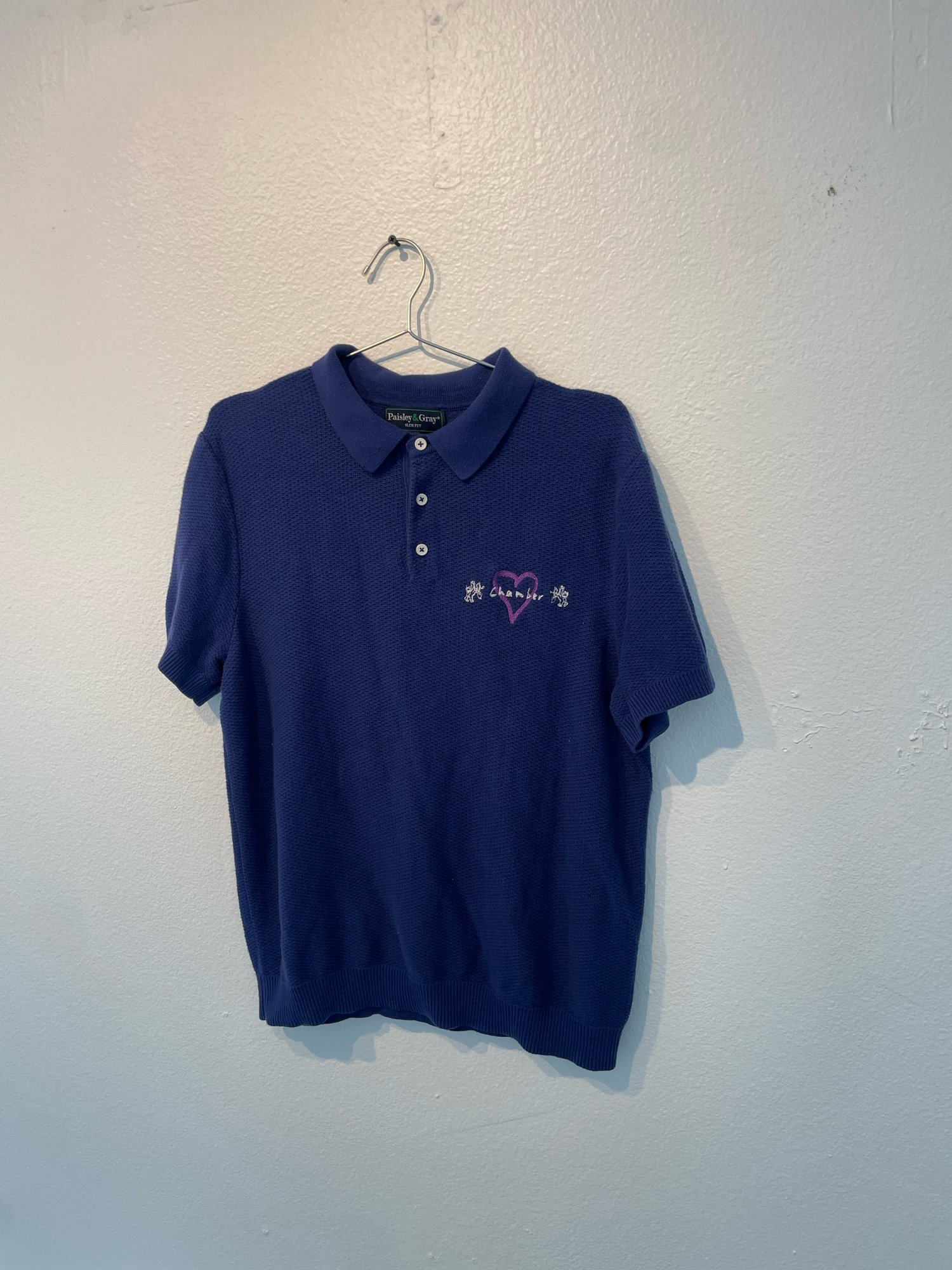 Image of Chamber of hearts soft knit polo 1/1