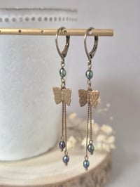 Image 1 of Boucles d'oreilles perles et papillon bronze