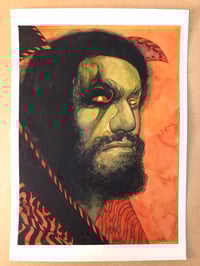 Image 1 of Green man on orange
