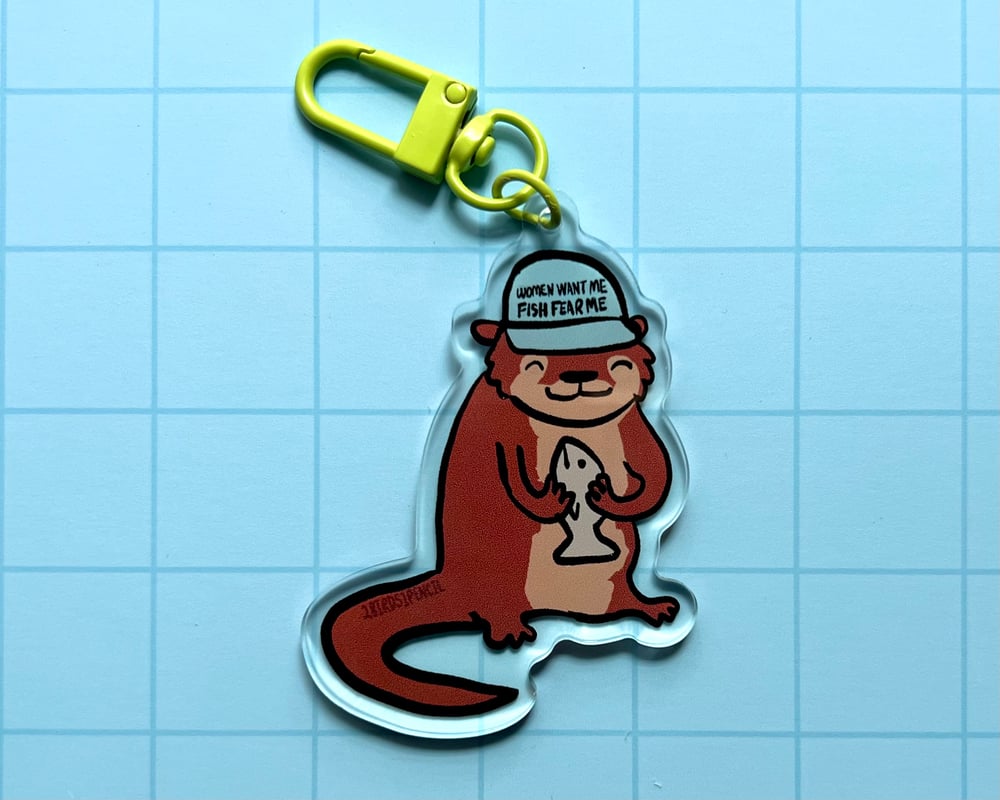 Image of Fisherman otter acrylic charm/keychain