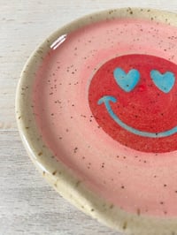 Image 3 of Pink & red Smiley spoon rest.