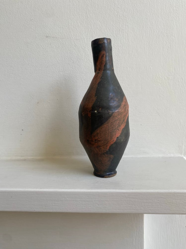 Bottle with narrow base