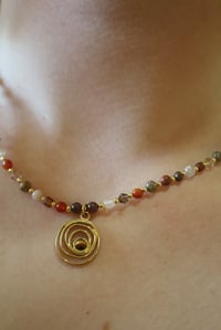 Image 3 of Brown Swirl (gold spacers)