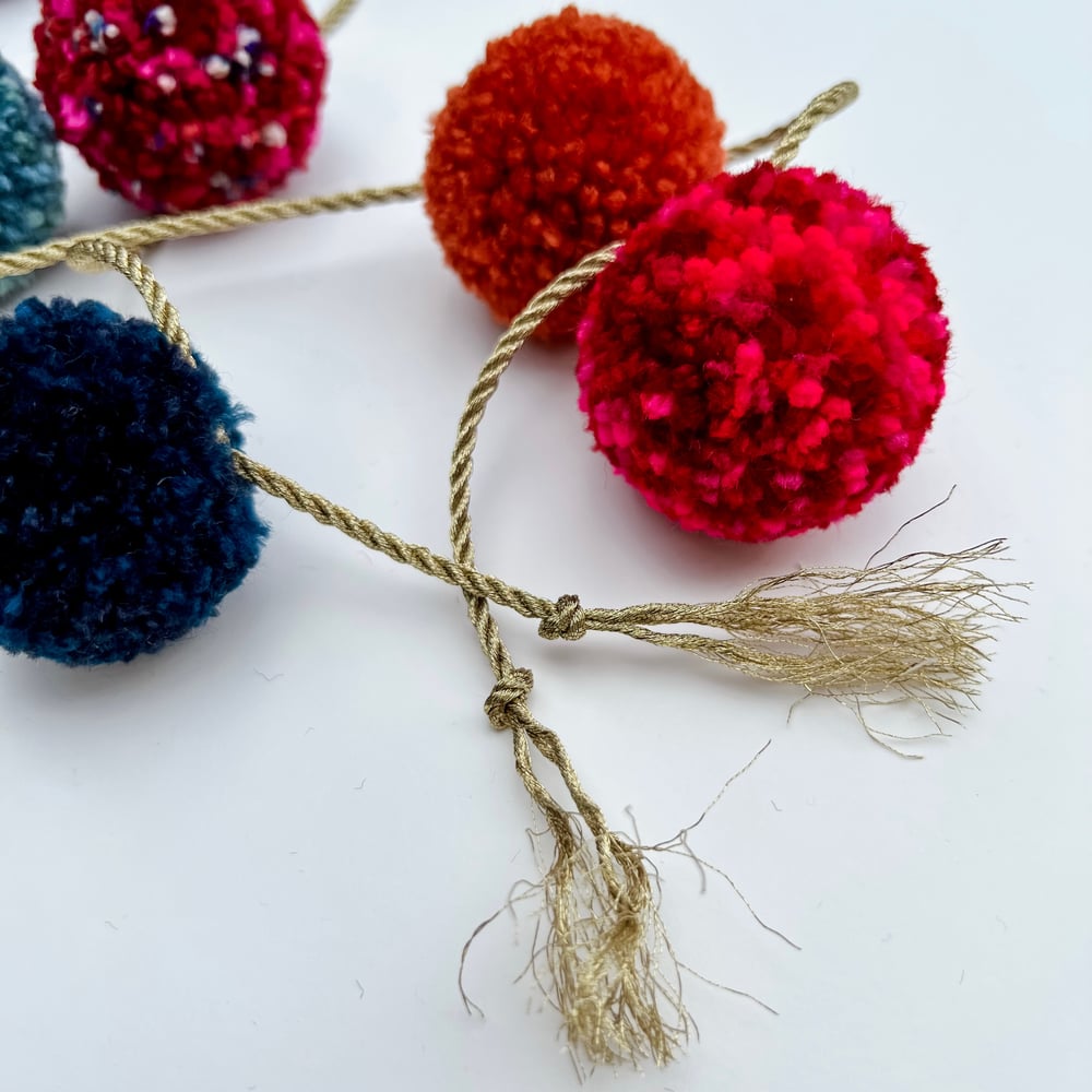 Image of Brightly Colored Pompom Garland with 2inch Poms