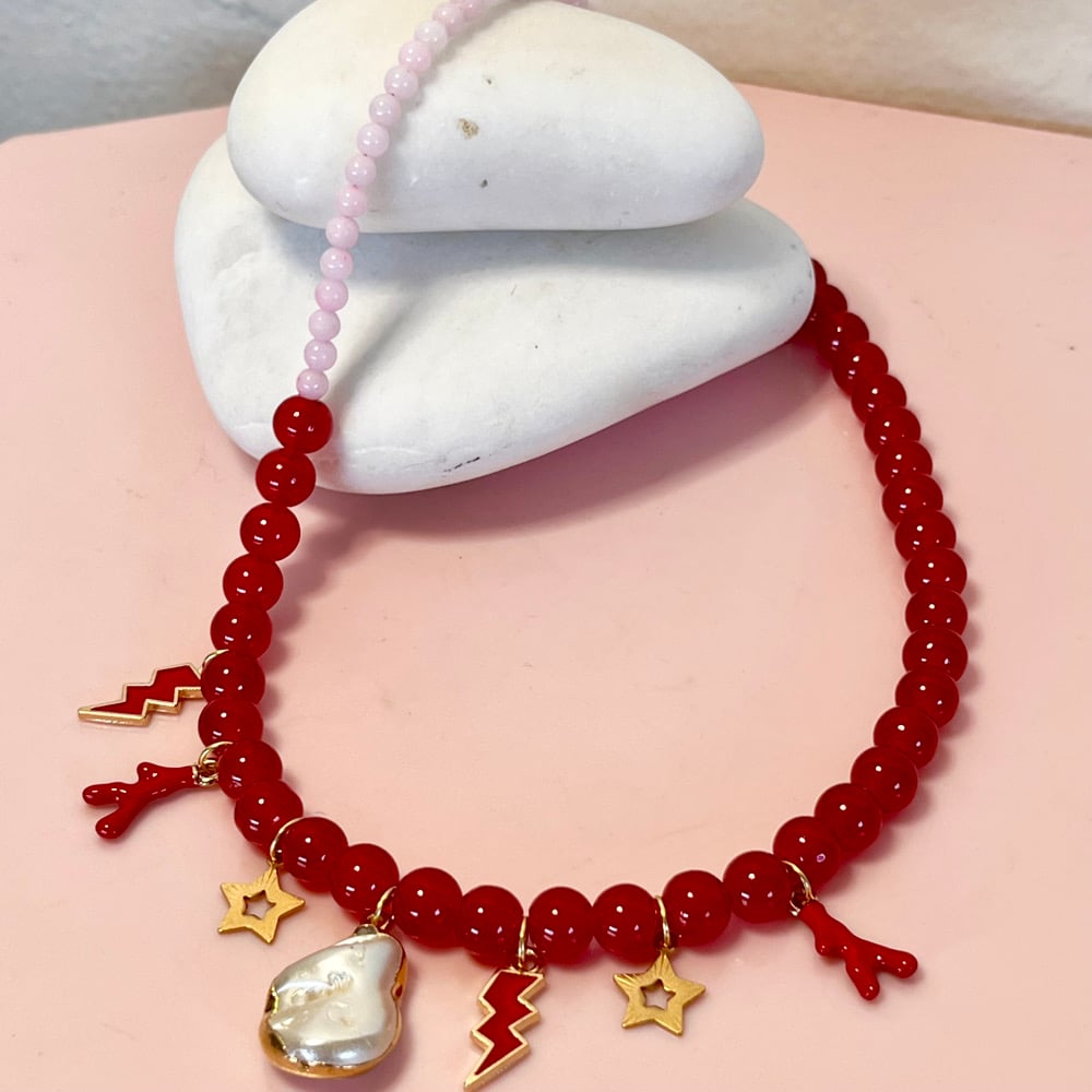 Image of Pink and Red glass bead necklace with pearl, lightning bolts and coral drops