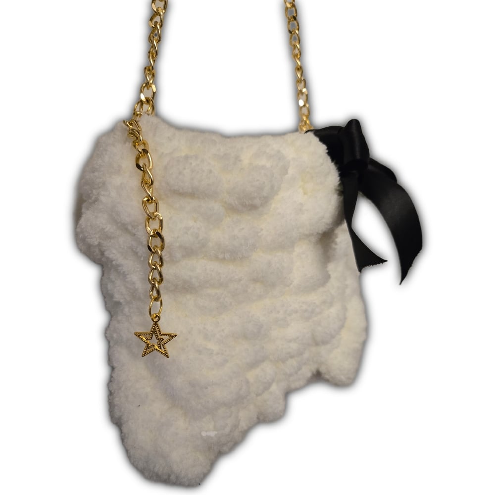Image of off white fluffy knit purse