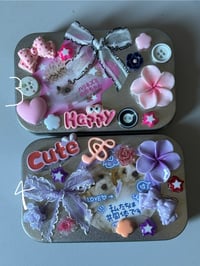 Image 3 of happy critter tin wallets