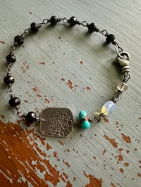 Image 8 of faceted gemstone and sterling silver medallion bracelet