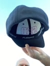 Limited Black fitted Flexfit Hat with Magenta SSD Outline Logo