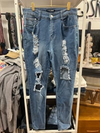 Image 1 of Fashion Nova distressed jeans 