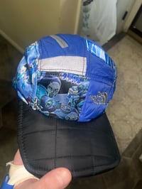 Image 2 of NF DOOM 5-Panel Glow Reflect Puffer Brim
