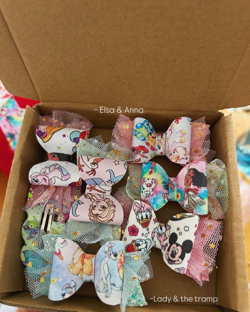 Image of £2.40 Disney bow sale 