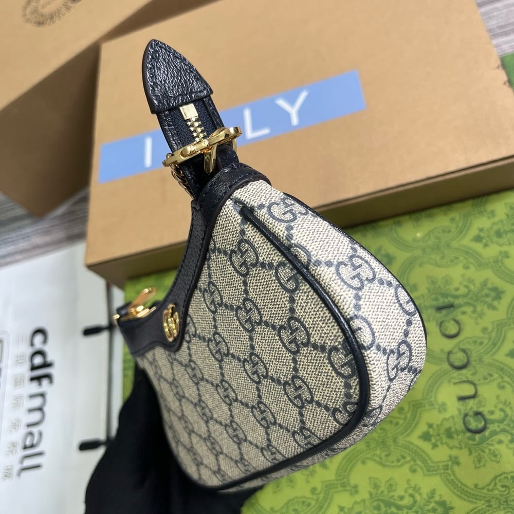 GG Canvas Mini Pochette 