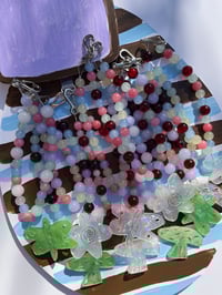 Image 1 of glass bead phone charms with trinket 