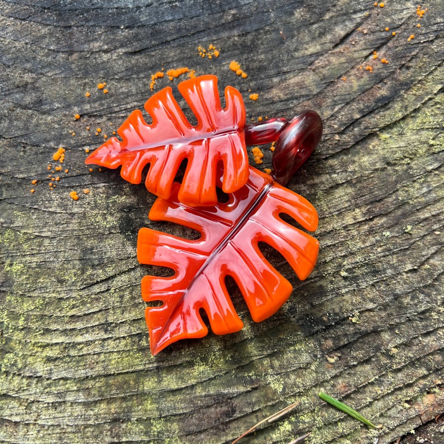 Image of Double Orange Sunburst Monstera Leaf Pendant