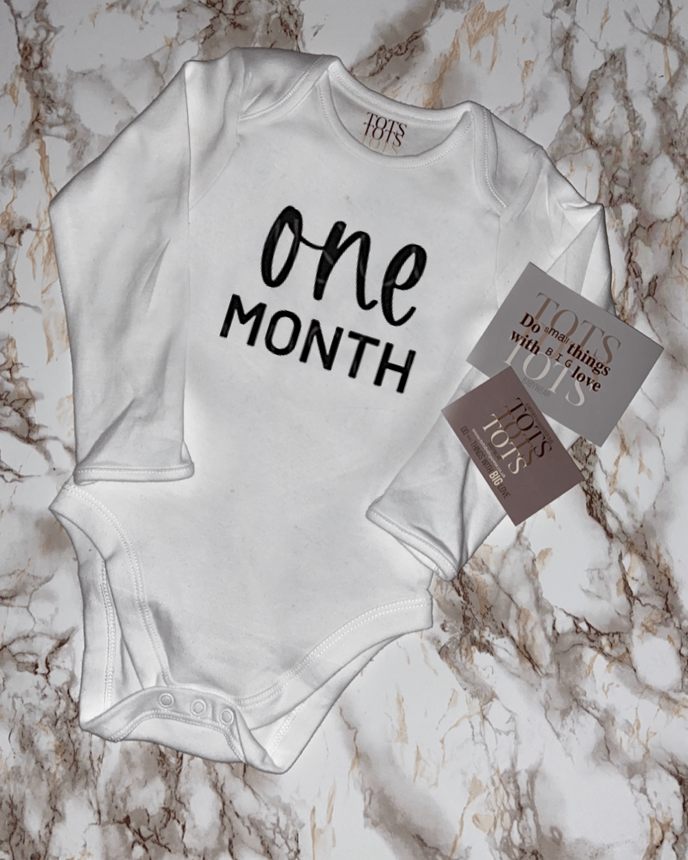 Milestone Bodysuit