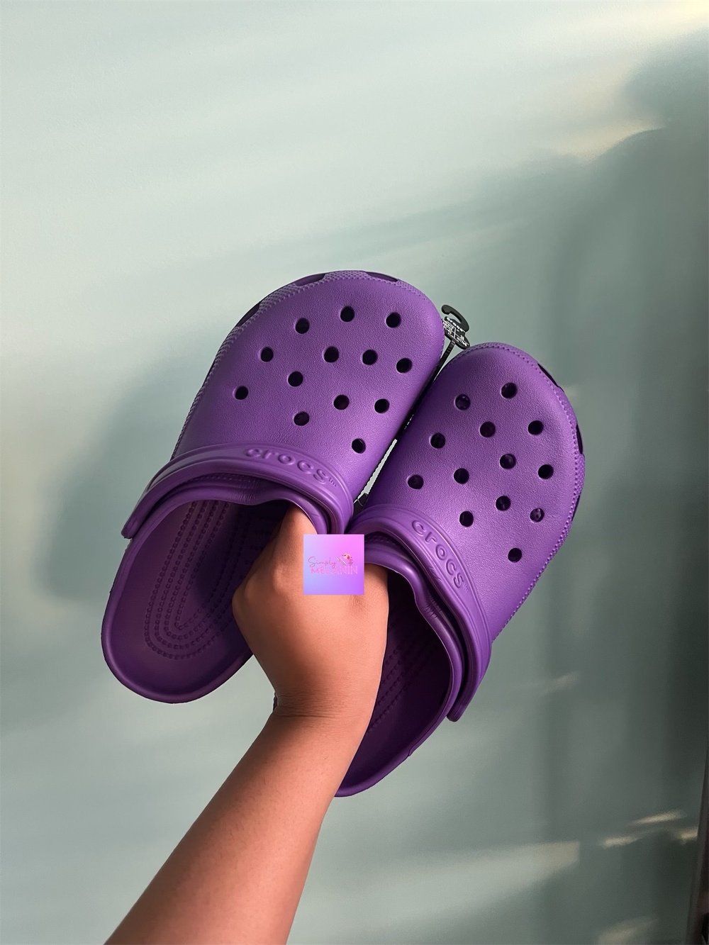 Image of crocs 💜. 