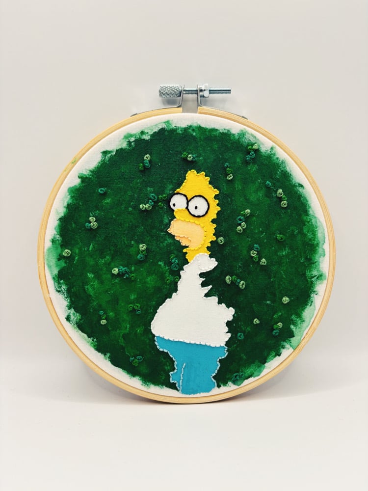 Image of Homer in a hedge