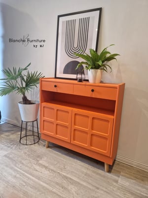 Image of Slim / Narrow hallway Sideboard in Tuscan Orange with black knobs.