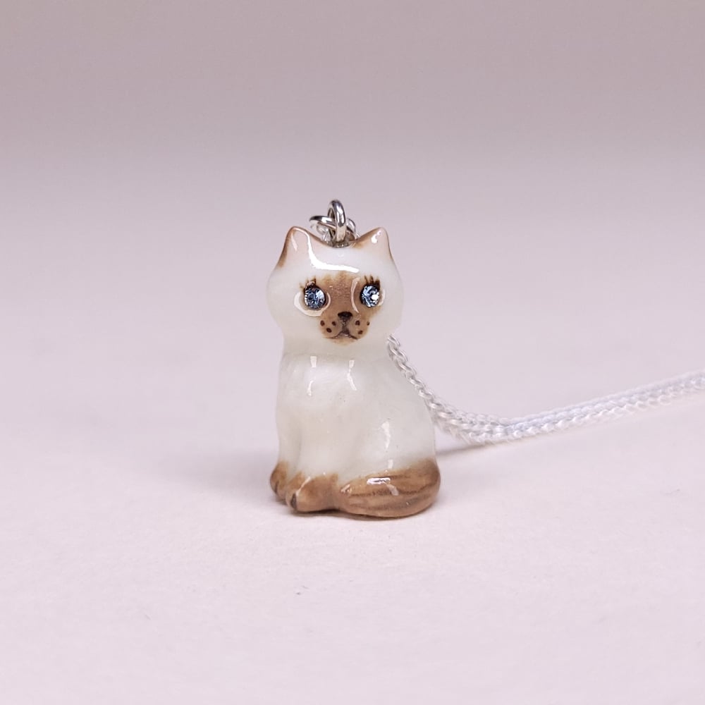 Image of Ragdoll Porcelain & Sterling Silver Sitting Kitten Pendant