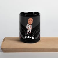 Image 1 of Consistency is Key Black Glossy Mug