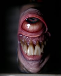 Image 15 of Faded Face Bic Lighter Sleeve