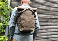 Image 2 of Field tan backpack medium size rucksack in waxed canvas, with volume front pocket and double layered