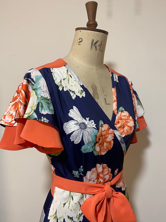 Image of Colour block floral wrap dress