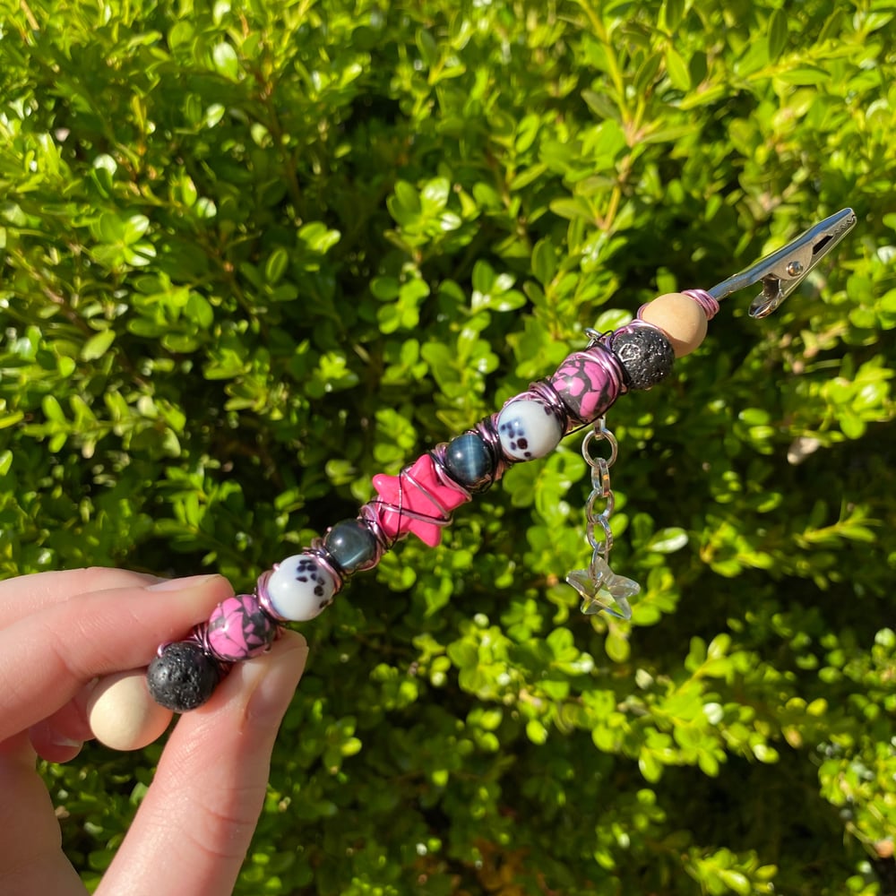 Image of punky pink roach clip 