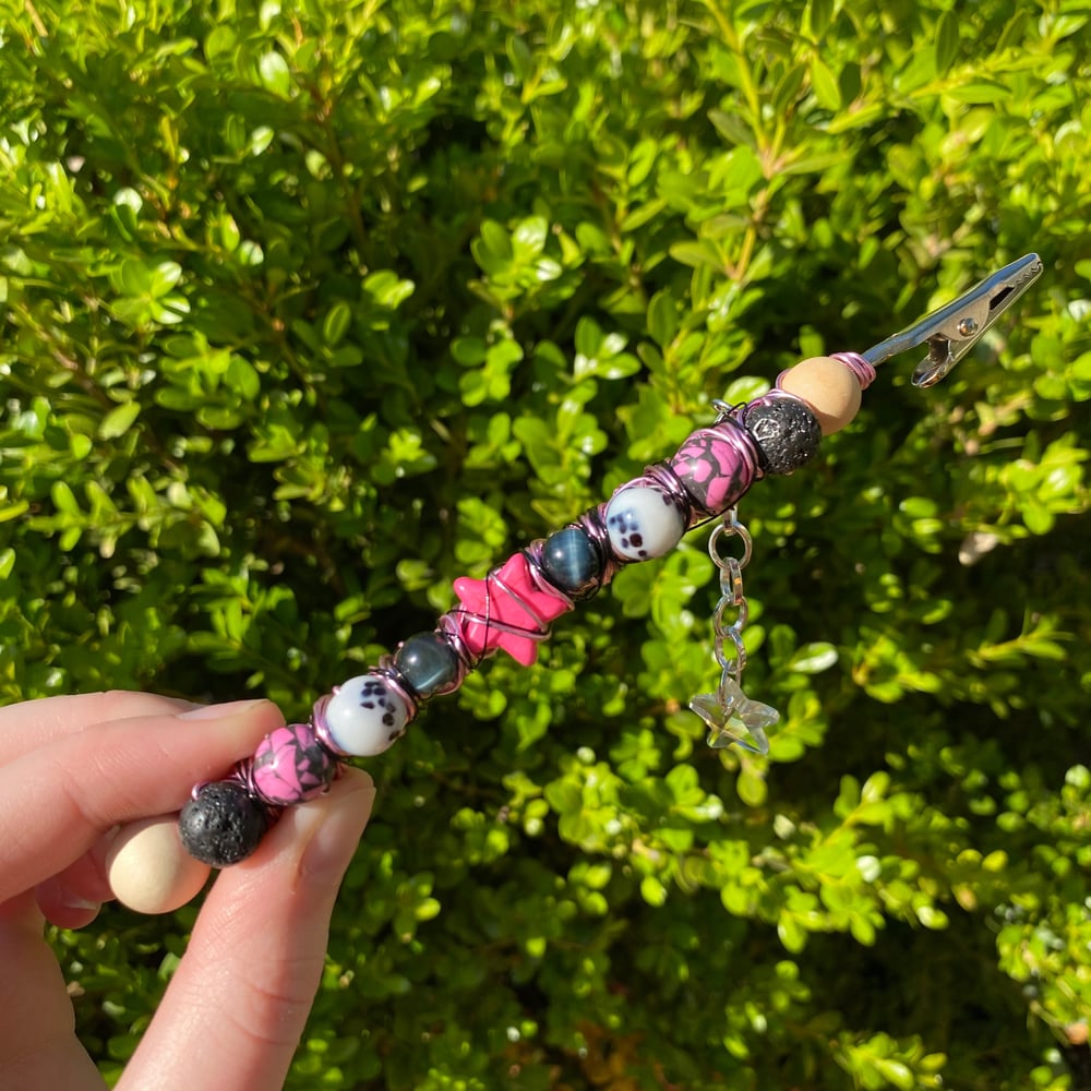 Image of punky pink roach clip