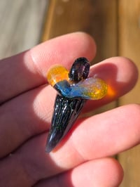 Image 3 of Fully opalized amber purple/ black glass shark tooth pendant 