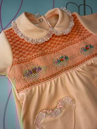 Image 2 of girls peach smocked babygrow 