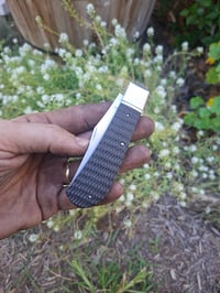 Image 1 of Clip point slipjoint, jimped richlite scales
