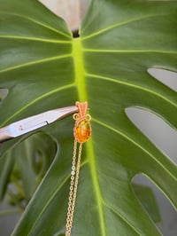 Image 2 of Gold Flower Amber Oval Crystal Necklace