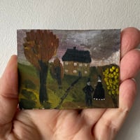 Lady and gentleman by acorn cottage